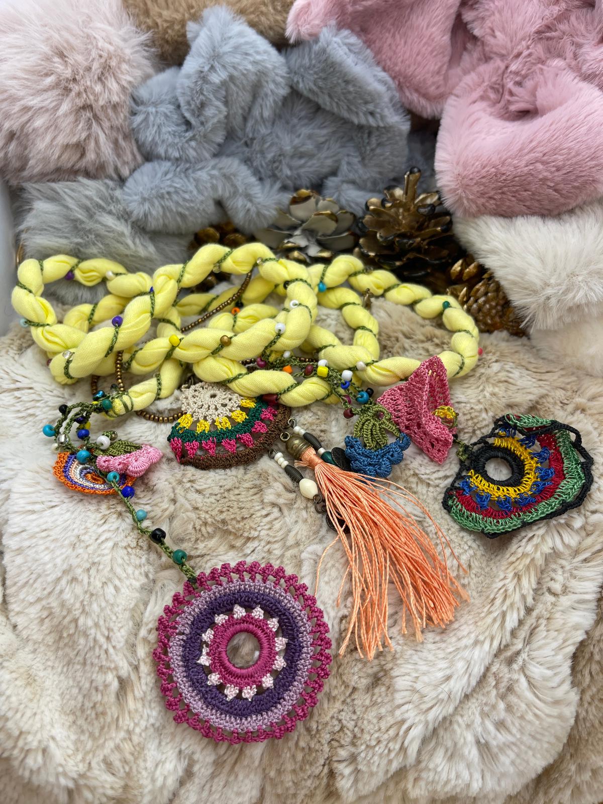 Colorful Embroidered Bohemian Design Necklace on Yellow Fabric